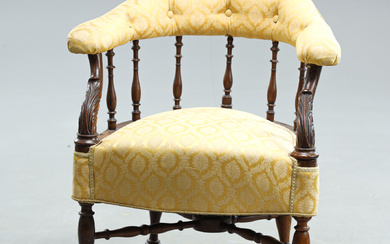 An English Edwardian armchair, circa 1900.