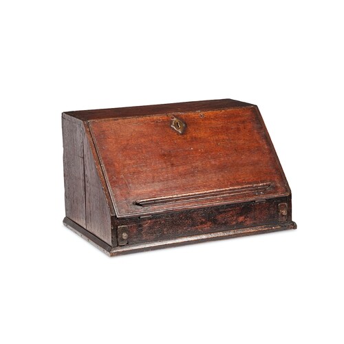 An early 18th century oak table top bureau The rectangular t...