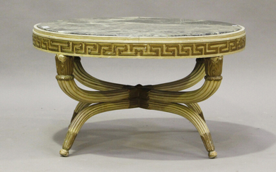 An early 20th century Neoclassical style white painted and gilt marble-topped circular lamp table, r