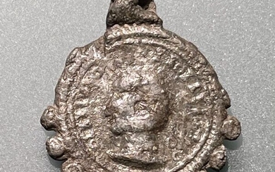 Ancient Roman (Barbaric Invasions) Bilon Serrated Amulet with a Barbaric Imitation of a Roman Coin:Portrait, Crescent with Circle Stars & Sun