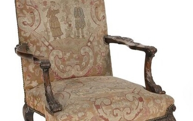 CONTINENTAL CARVED AND UPHOLSTERED ARMCHAIR Early 20th