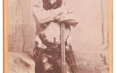 Cabinet Card of a Well-Armed Man