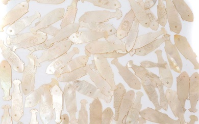 Collection of eighty-five Chinese mother of pearl fish shaped counters