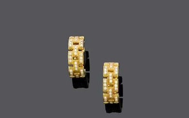 DIAMOND AND GOLD EARCLIPS, BY CARTIER.