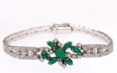 Diamonds and emeralds bracelet, circa 1970.