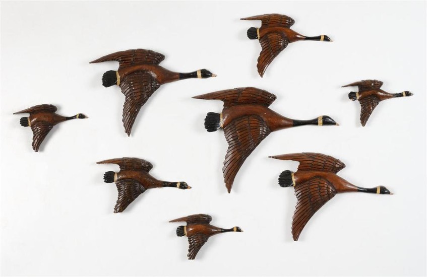 EIGHT CARVED WOODEN FLYING CANADA GEESE PLAQUES Maker unknown. In flying form. Lengths from 5" to 11".