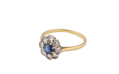 Edwardian A circular cut sapphire cluster ring Withi...