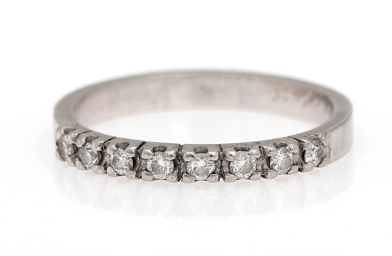 SOLD. Eliise Maar: A diamond eternity ring set with eight brilliant-cut diamonds weighing a total...