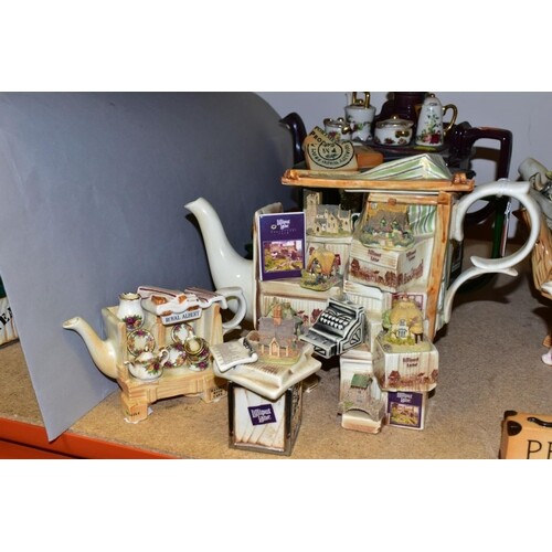 FOUR CARDEW DESIGNS COLLECTORS TEAPOTS AND A NOVELTY SUGAR B...