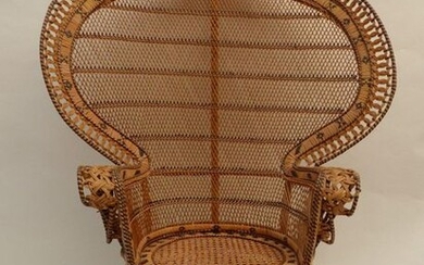 Armchair "Emmanuelle" in tinted and braided rattan. Period: around 1970....