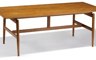 Finn Juhl: “FJ 50”. Desk with solid oak frame. “Floating” walnut top with profiled edges. Made by Baker Furniture Inc.