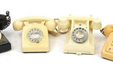 Four vintage Bakelite dial telephones including a cream