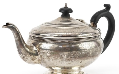 G Bryan & Co, George V silver teapot with ebonised wood hand...