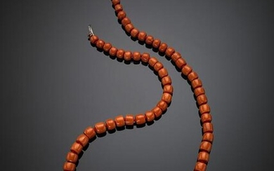Graduated orange coral bead necklace with bi-coloured