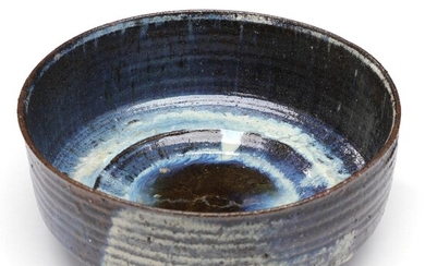 SOLD. Gutte Eriksen: A circular earthenware bowl. Decorated with dark blue, light grey, dark brown and transparent Borax glaze. Signed Gutte. Diam. 22.5 cm. – Bruun Rasmussen Auctioneers of Fine Art