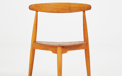 HANS J WEGNER. A mid 20th century “Hjertestolen” chair, beech and teak veneer, Fritz Hansen, Denmark. Beech and teak.