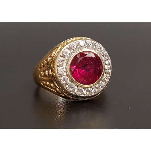 IMPRESSIVE RUBY AND CZ DRESS RING the central bezel set roun...