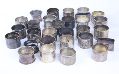 Important set of twenty-nine silver napkin rings, of different models and goldsmiths.