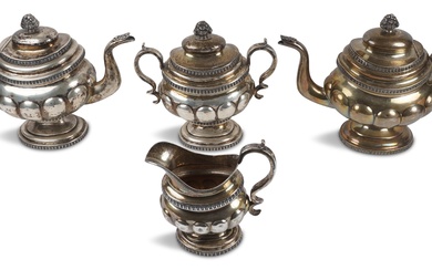 JONATHAN STODDER (NEW YORK) THREE-PIECE COIN SILVER TEA SET, CIRCA 1830, TOGETHER WITH A MATCHING LATER COFFEE POT BY S. KIRK & SON CO. Height of tallest: 9 1/2 in. (24.1 cm.)
