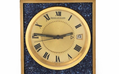 Jaeger-LeCoultre small travel watch in case of faux lapis lazuli. Golden dial...