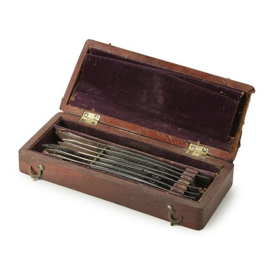 Mahogany box with six surgical scalpels, W. & H.