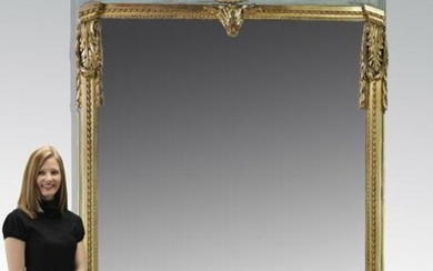 Monumental French gilt-decorated mirror, 118"h