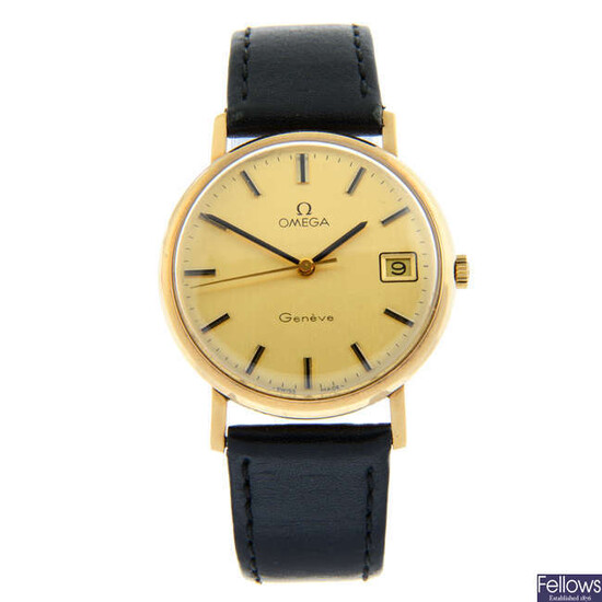 OMEGA - a yellow metal Genève wrist watch, 33mm.