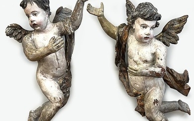 PAIR OF ITALIAN LARGE CARVED AND POLYCHROMED CHERUBS
