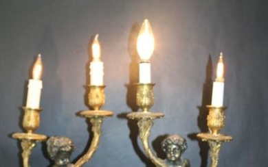 Pair French bronze baby Bacchus and fawn lamps