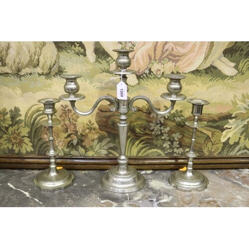 Pair of French cast metal candlesticks along with candelabru...