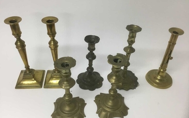 Pair of George I / II brass candlesticks, together with two similar sticks and two later