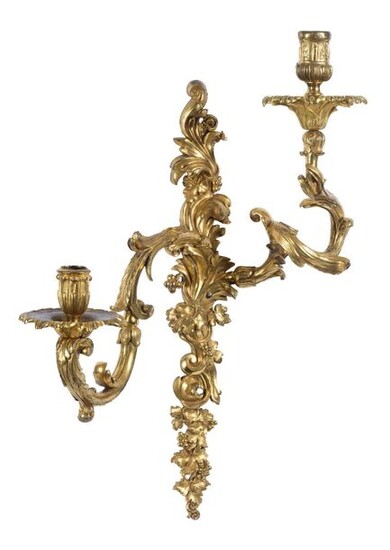 Pair of finely chiselled and gilded bronze sconces.