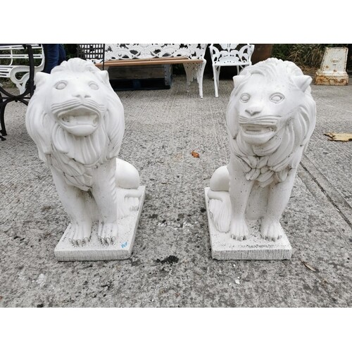 Pair of moulded stone seated Lions {65 cm H x 29 cm W x 55 c...