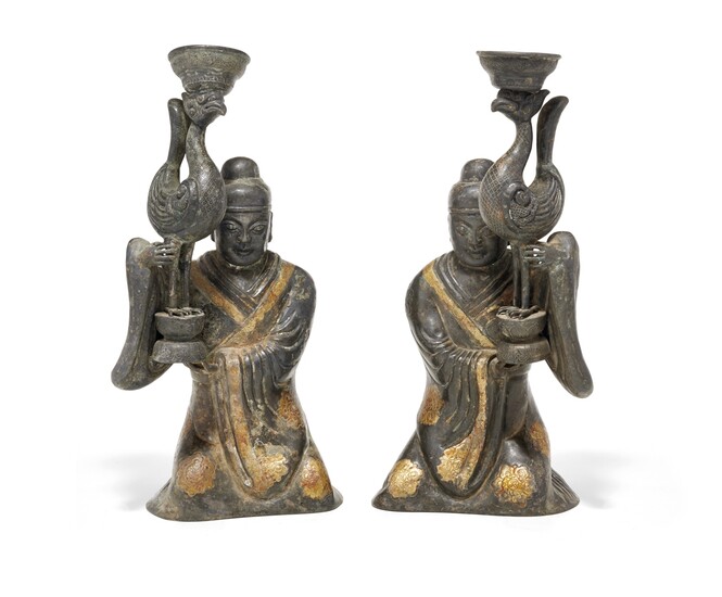Pair of partially gilt silver kneeling figures China, early 20th Century