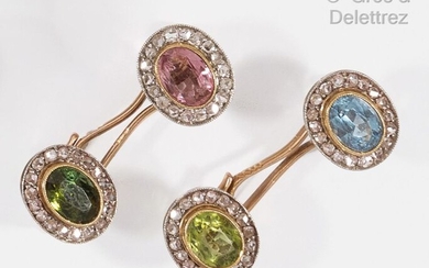Pair of yellow gold cufflinks adorned with sapphire, tourmaline and...