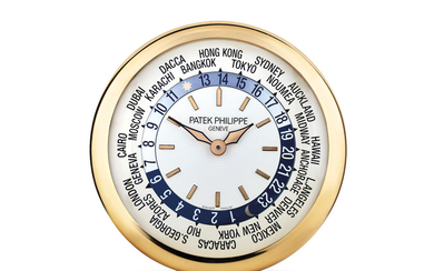 Patek Philippe. A Rare Large and Heavy Polished Brass and Stainless steel World Time Wall Clock