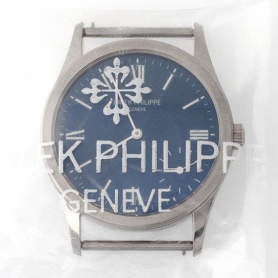 Patek Philippe. Limited Edition and Sophisticated Calatrava Wristwatch in White Gold Reference 5026, With Blue Dial Made for the New Millennium and Extract from Archives
