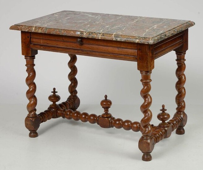 Rectangular Louis XIII style middle table in carved walnut wood opening with a drawer in the belt. Spiral "H" shaped base with three spinning tops. Topped by a table top in Breche de Saint-Remy marble. French work. Period: late 17th century...