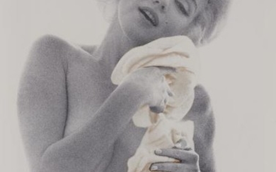 STERN, BERT (1929-2013) Marilyn Monroe with yellow roses