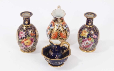 Selection of early 19th century miniature English porcelain, including a Spode jug and basin, a Crown Derby jug, and a pair of floral painted bottle vases (5), the largest measuring 8.75cm height