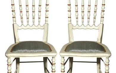 Set of 9 white distressed paint decorated and gilt gold Gustavian Style side chairs. Each seat with