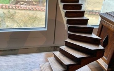 Sharply angled oak staircase, fixed on a large...