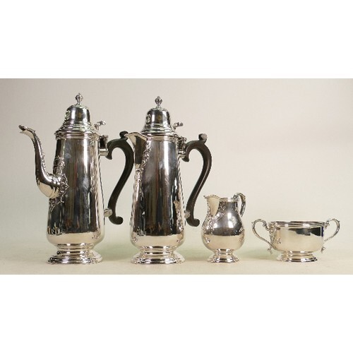 Silver four piece decorative coffee set: Hallmarked for Shef...