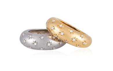 TWO DIAMOND RINGS Each bombé mount, star-set with brilliant-cut diamonds,...