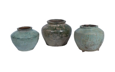 Three Chinese Pale Green Iridescent Glazed Pottery Jars, Han Dynasty (206 BCE-220)