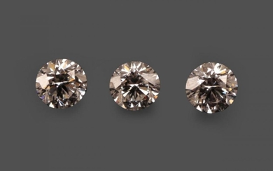Three Loose Round Brilliant Cut Diamonds, weighing 0.55, 0.59 and...