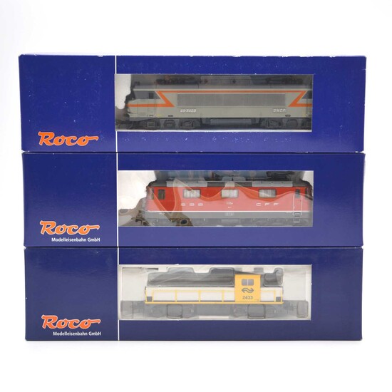 Three Roco HO model railway diesel locomotives.