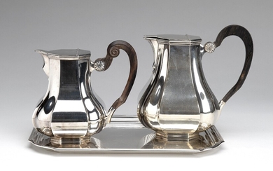 Two Dutch silver jugs with cover and tray