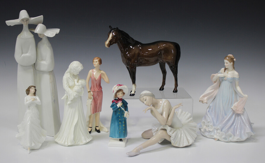 Two Lladro figures, comprising The Death of the Swan, No. 4855, and Nuns, No. 4611, together with a