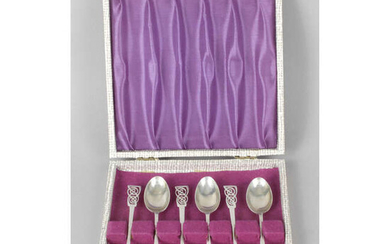 Two cased sets of mid-20th silver coffee spoons.